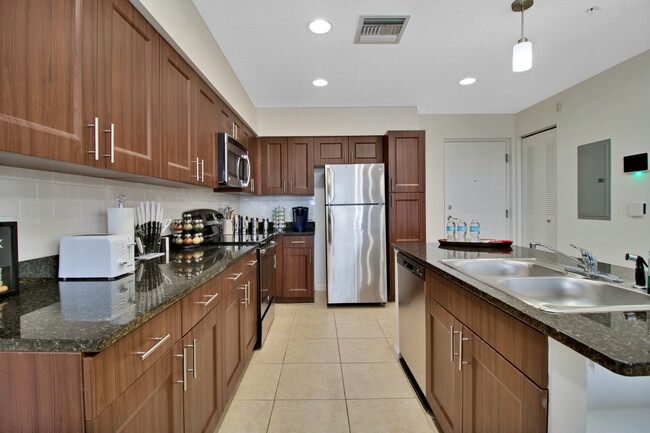 Fully stocked kitchen with all appliances, dishware, and cutlery - 699 Brandon Prescott Ln