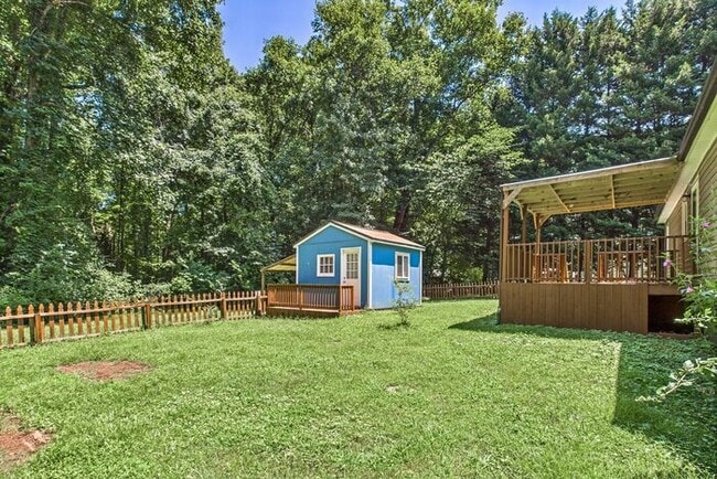 Building Photo - Charming Ranch Home with Bonus Studio & Ou...