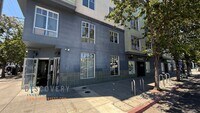 Building Photo - Stylish Uptown Condo in Prime Location