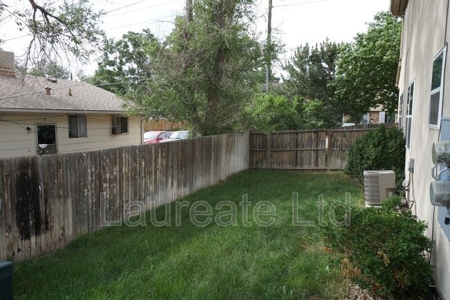 Building Photo - 6062 E 62nd Ave