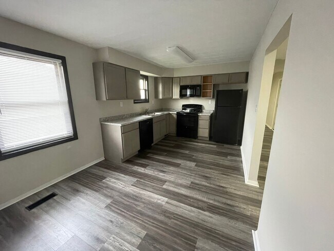 Building Photo - Oversized 3 Bedroom with laundry room!