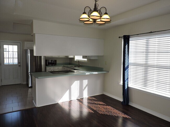 Building Photo - Easy access to shopping, interstate & Navy Federal complex!