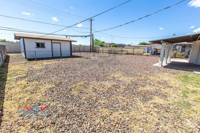 Building Photo - 6415 E Aspen Ave