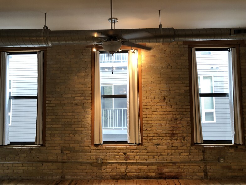 Cream City brick with high efficiency windows and insulated curtains - 1017 S 2nd St