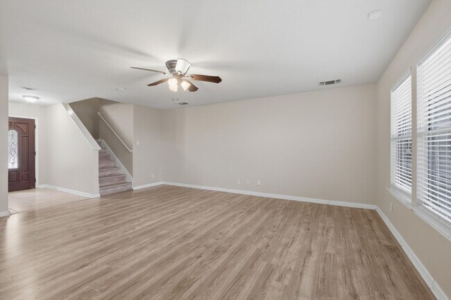 Building Photo - 4BR Home with Open Living Area & Included Appliances