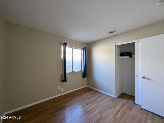 Building Photo - 7059 W Gardenia Ave