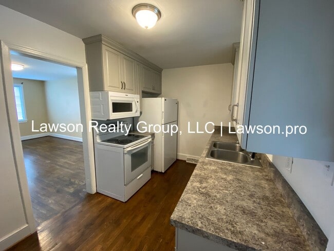 Building Photo - Updated Four Bedroom Home with a Full Walkout Basement