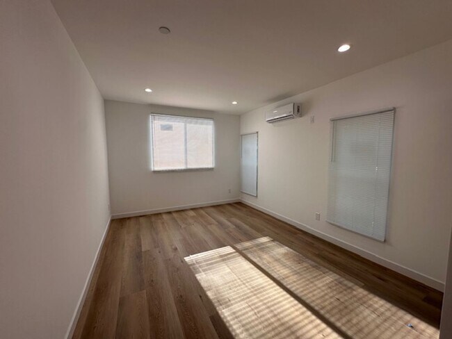 Building Photo - Completely remodeled and located on a quie...
