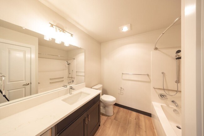 Building Photo - BRAND NEW - Reserve Street Lofts - Gated - Ground floor unit / ADA features