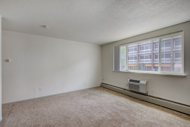 Step into a bright and inviting space, ready to be personalized. - Melody Apartments
