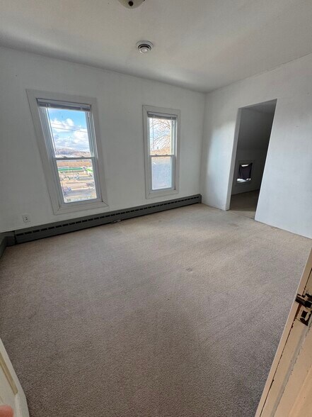 Bedroom 1 with large closet - 10 E Nelson St