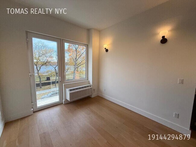 Building Photo - 3103 Sedgwick Ave