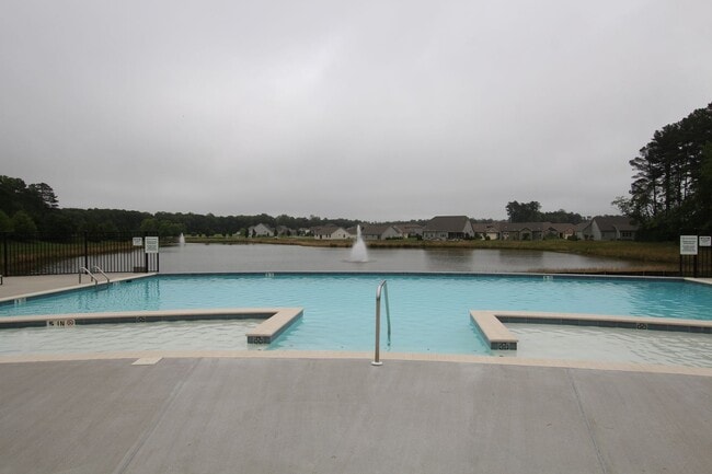 Building Photo - Maintenance Free Living in this Brand New ...