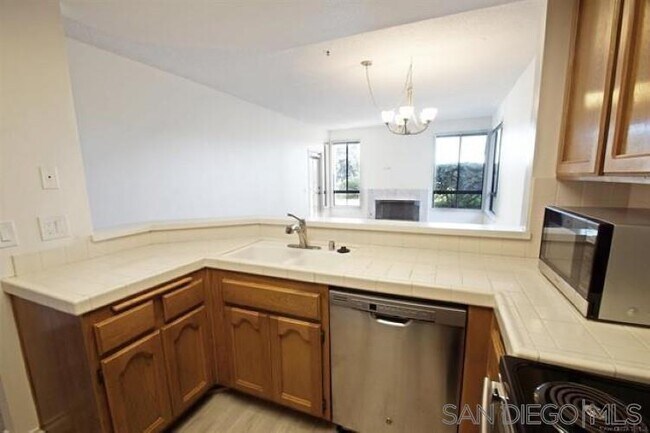 Building Photo - 5865 Friars Rd