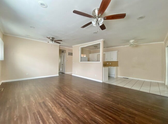 Building Photo - 3 bed 1 bath 2 car garage now available in...