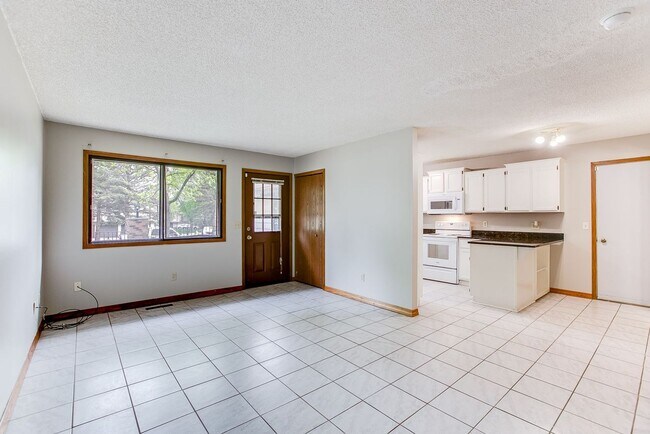 Building Photo - 2 Bed | 1.5 Bath | Townhome in Eden Prairie | 2 Garages Spaces Included