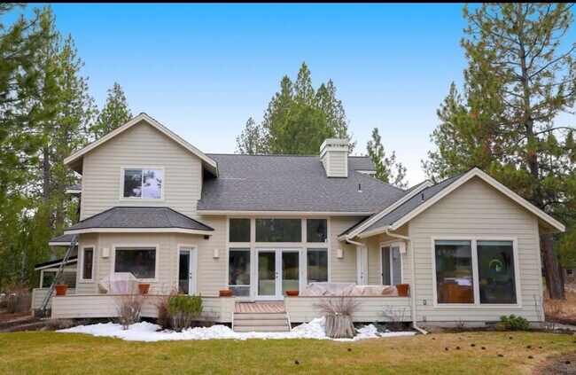 view of back of house - 60709 Golf Village Loop