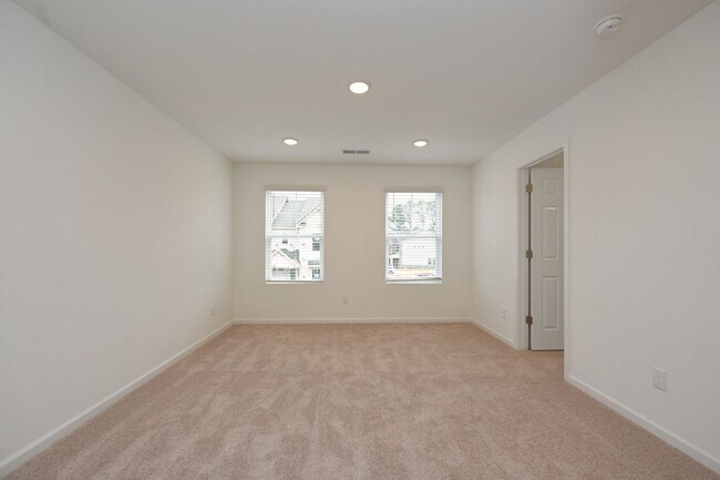 Building Photo - **BE THE LUCKY ONE TO LIVE IN THIS 2024-BUILT BRICK TOWNHOME IN THE VILLAS AT REGAL SQUARE FEATUR...