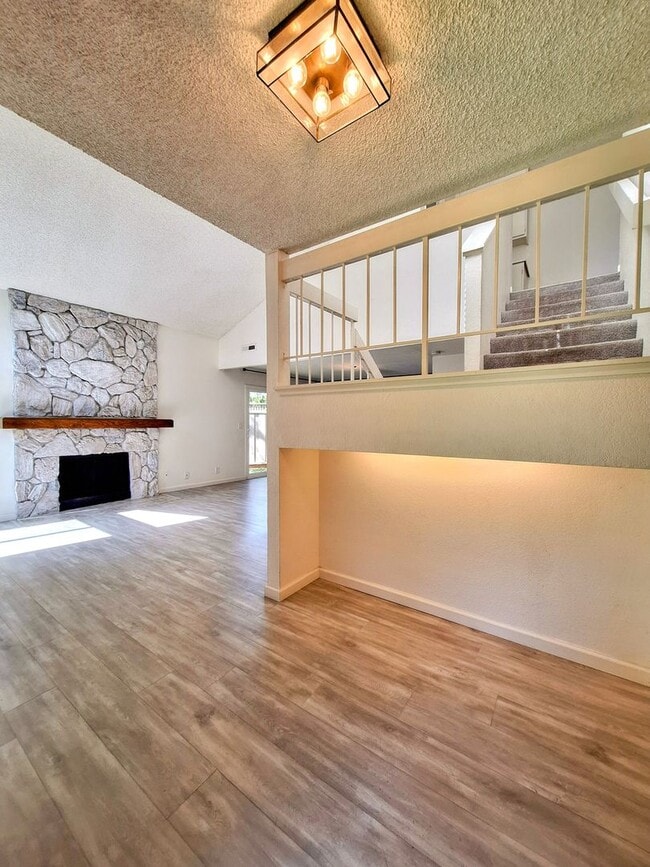 Building Photo - Spacious Two-Story 3bd Townhouse With Private Patios, Balcony, & Garage