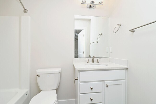 Building Photo - $500 Off 1st Month's Rent! Dog-Friendly End-Unit Apartment