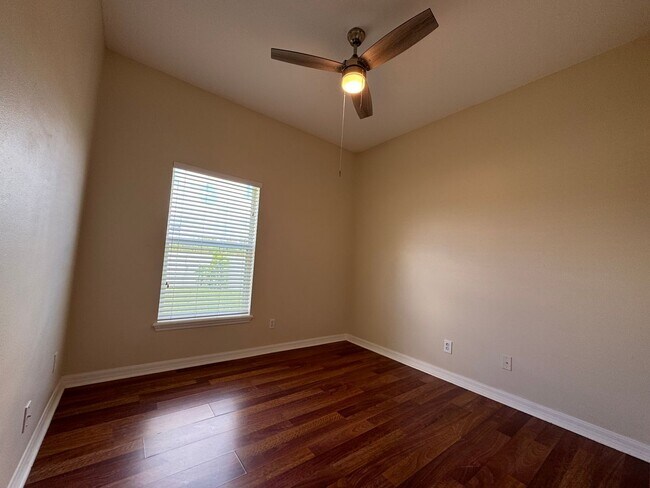 Building Photo - Beautiful 3/2 home near Lake Nona ~ Fenced In Yard ~ LVP & Tile Flooring ~ Community Pool!