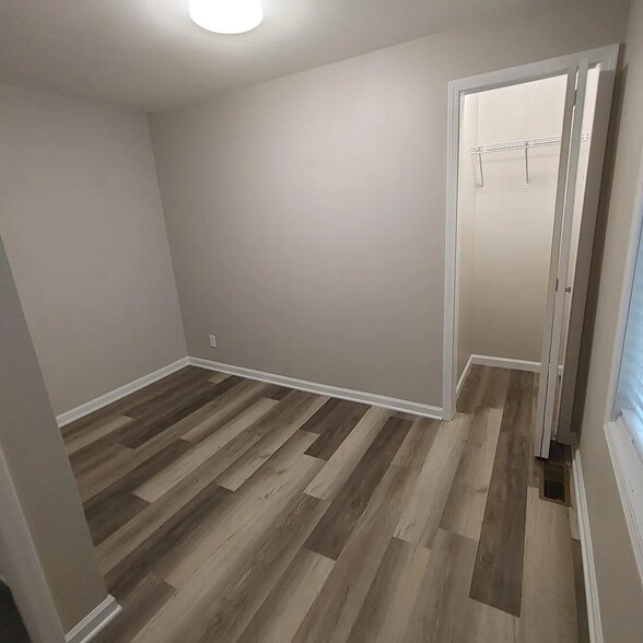 Smaller bedroom upstairs with closet - 96 Ponder St