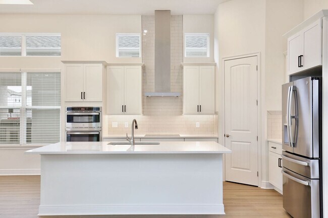 Building Photo - Gorgeous 4/3 Residence with a Private Back Lanai and a 2 Car Garage in the Delightful Laureate Pa...