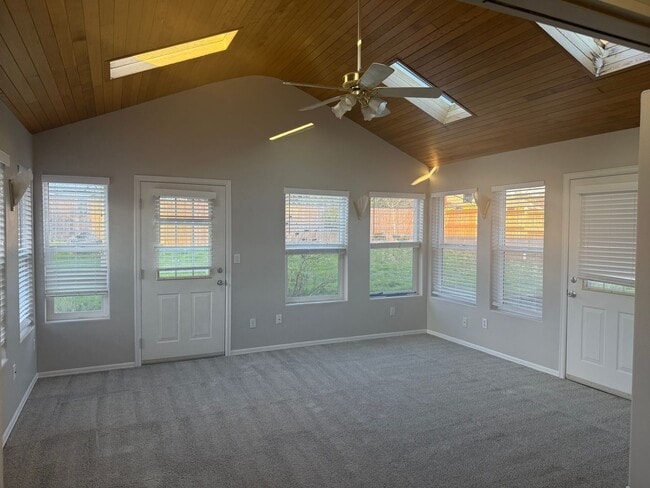 Building Photo - Charming 3 Bedroom with a Living Room, Sun Room,Huge Fenced Yard & More!