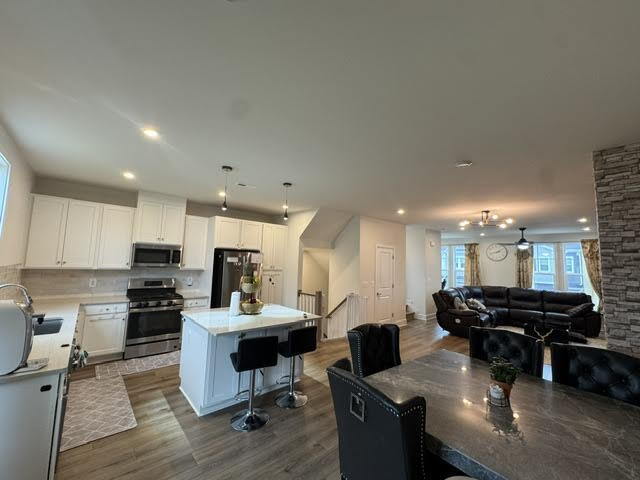 Building Photo - Available June 1st! Fully Upgraded 3 Bedroom, 3.5 Bath Townhome in the Desirable Lake Frederick C...