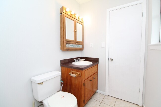 Building Photo - Charming 3-Bedroom Brick Home on Half an A...