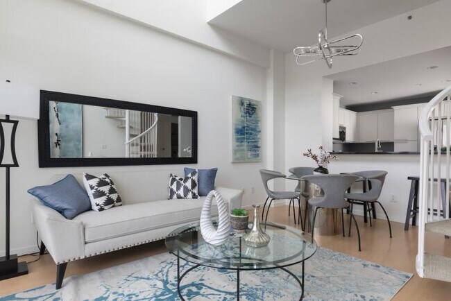 Building Photo - Penthouse loft with a private rooftop patio