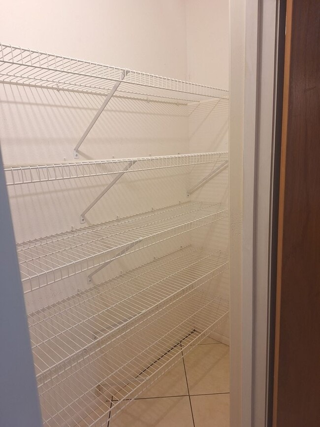 Building Photo - PELICAN COVE WEST 2BR 2BA WITH GARAGE FOR RENT