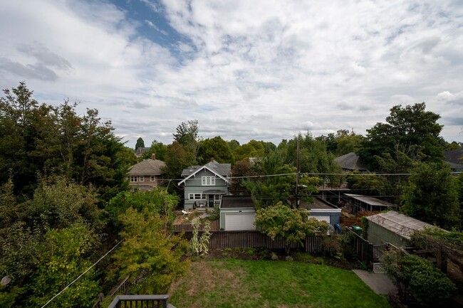 Building Photo - Traditional Four-Corner Craftsman Home on ...