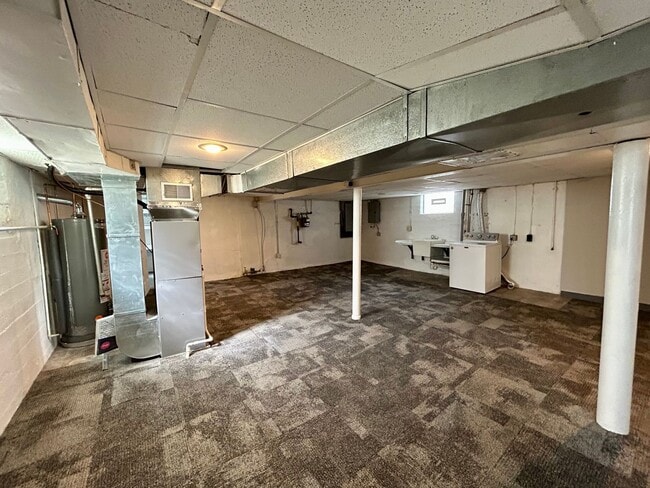 Building Photo - DELHI TWP- Spacious 4 bedroom 3 bath Cape Cod with garage