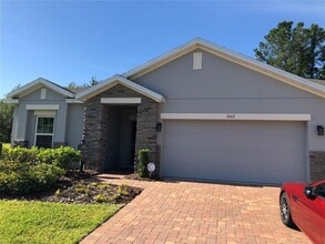 Building Photo - 5512 Windsong Oak Dr