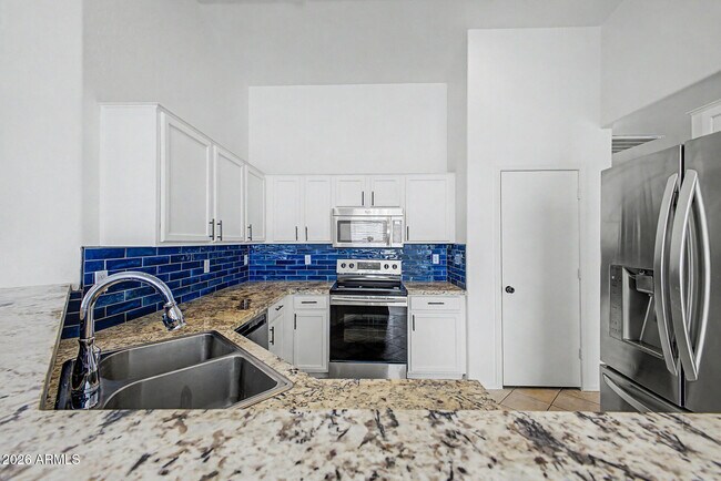 Building Photo - 15337 W Poinsettia Dr