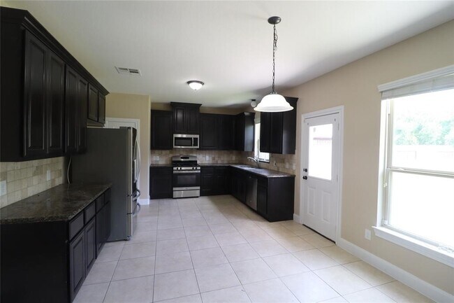 Building Photo - 8411 Creekside Timbers Dr