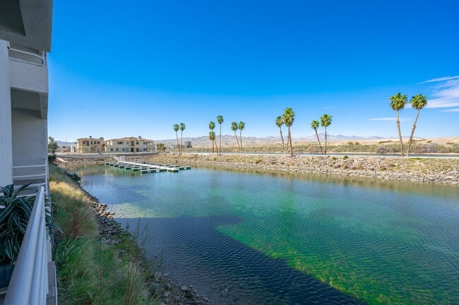 Building Photo - Live ON THE COLORADO RIVER – Fully Furnished 1 Bed/1 Bath Condo in the Gated Community of Roadhav...