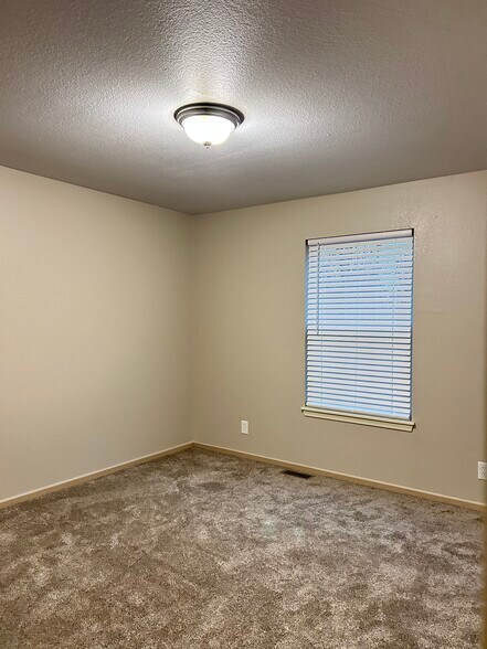 Second upstairs bedroom - 1211 NW Ashley Ln