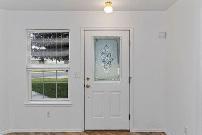 Building Photo - Wonderful 3 Bedroom Home with New Flooring and Paint