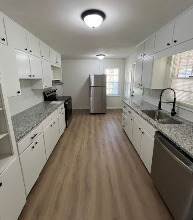 Building Photo - Spacious 4-Bedroom Home with Finished Base...