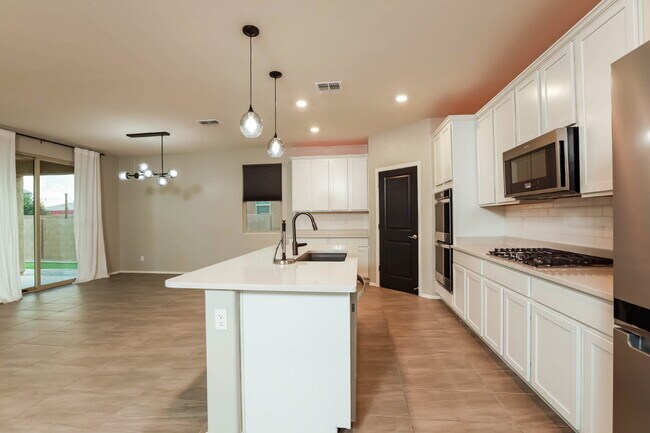 Building Photo - "Spacious 4-Bed Spacious two-level residential rental in Marana with modern Elegance!  Available ...