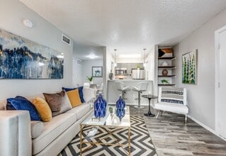 Dallas Apartments – Modern Living Room with Wood-Style Floors - Fountains of Jupiter