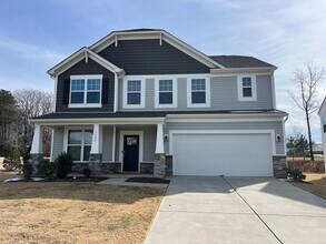 Building Photo - 2022 Four Bedroom Home Furnished