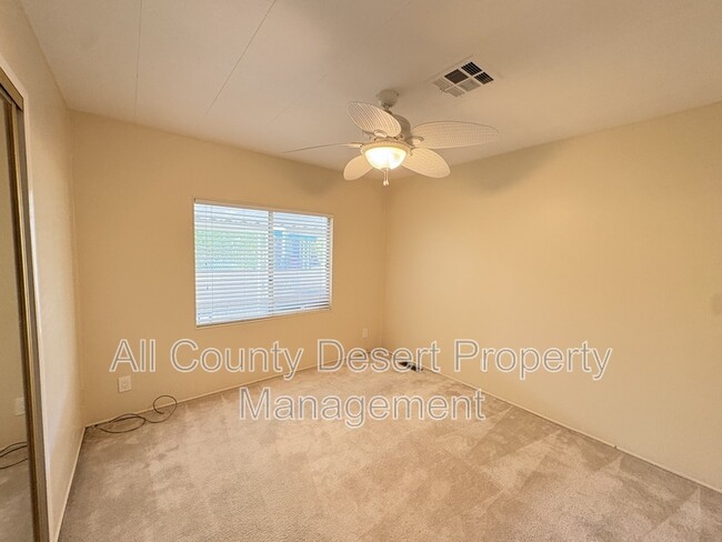 Building Photo - 38251 Desert Greens Dr E