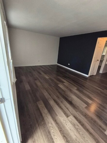 Building Photo - 7617 S Colfax Ave