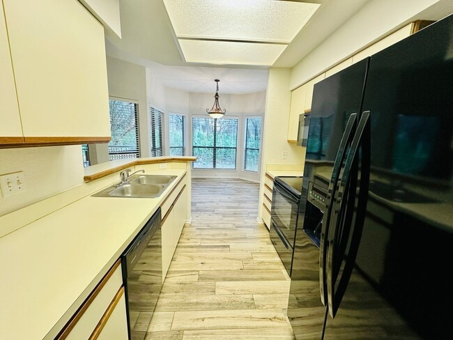 Building Photo - 1 MONTH FREE !!! - Charming 2 Bed 2 Bath Condo with Nature Views in Stillhouse Canyon - Spicewood...