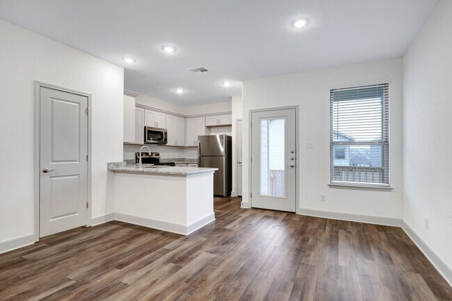 Building Photo - Beautifully Designed Townhome with Upscale Finishes