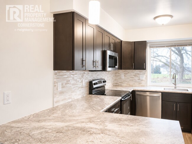 Building Photo - Modern Comfort Meets Peaceful Living