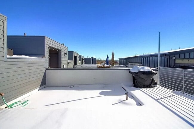 Building Photo - Modern LoHi Living with Rooftop Deck & City Views!!
